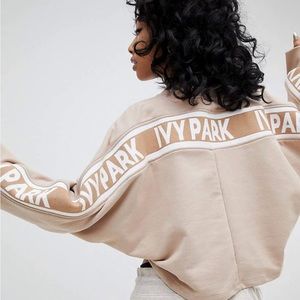 Ivy Park Cropped Sweatshirt With Taped Seams in Tan/Nude
